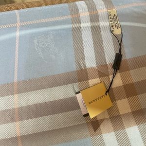 Brand NEW. Never worn.Burberry 70x28 scarf with fringe. Still in packaging.